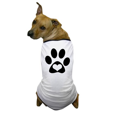 photo of dog wearing white tshirt with black paw print with white heart